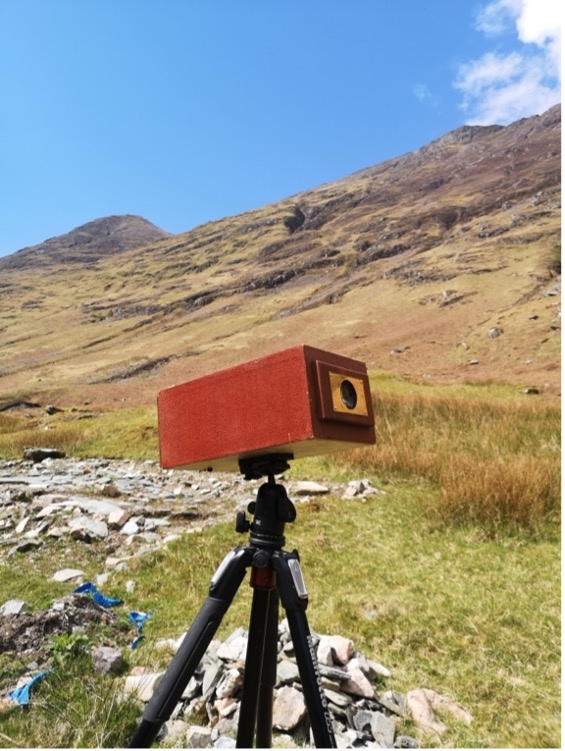 A camera obscura built by Gareth being used in Glencoe during the making of Achtriochtan
